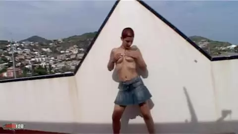 La belle Katia faisant un striptease sur la terasse  photo 11