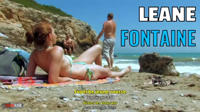 Superbe jeune rousse française se fait dilater les trous par deux brutes à la plage