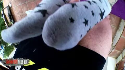 Naughty hot brunette doing footjob