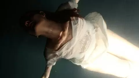 La belle petite à gros nichons Mademoiselle Lilith fait un strip devant la piscine  photo 4